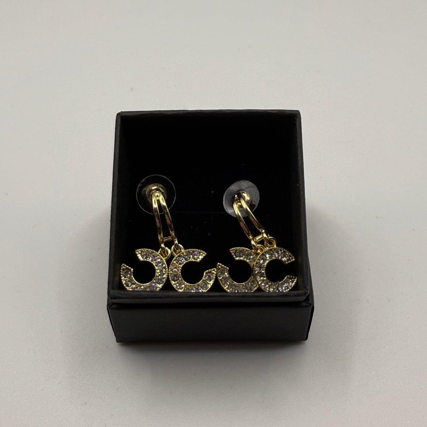 CC gold plated with clear crystals