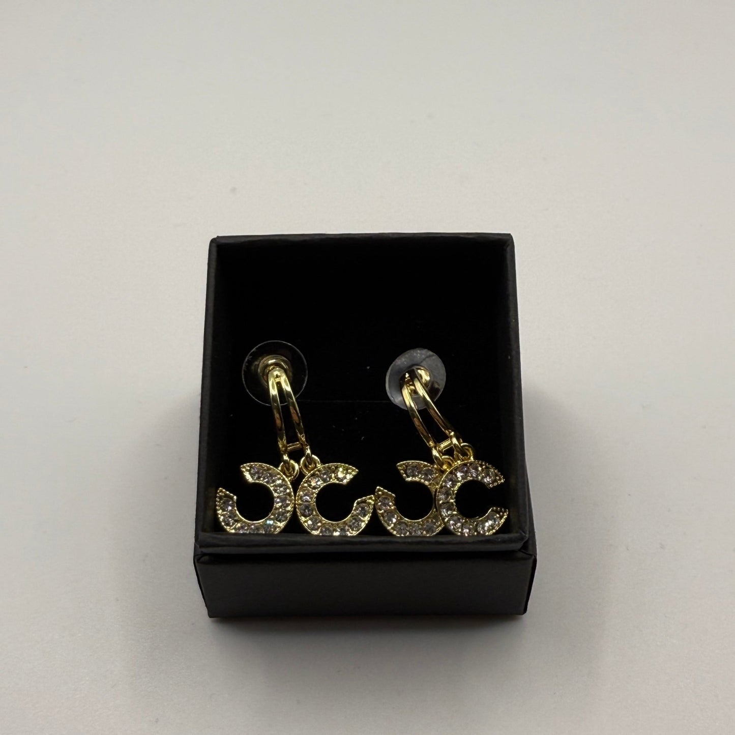 CC gold plated with clear crystals