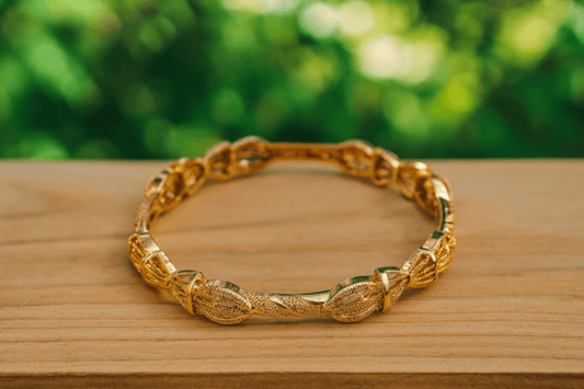 Dubai 18cct gold plated bangle with bows